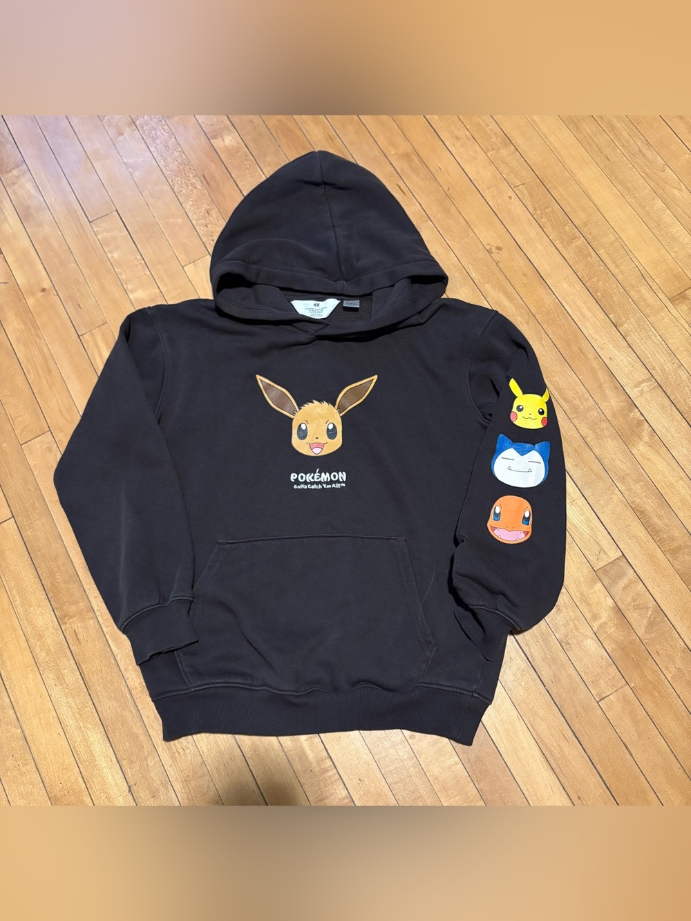 H&M Black Kids Hoodie with Eevee and Pokรฉmon Sleeve Faces